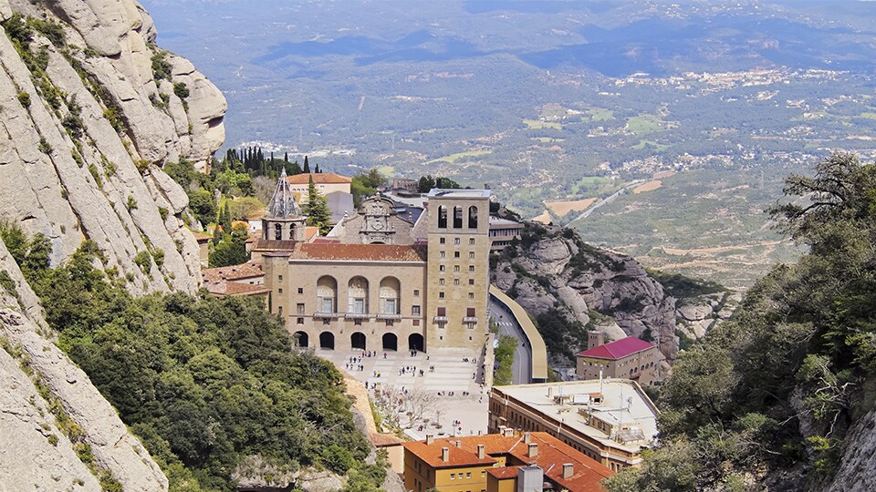 Santa Maria de Montserrat Abbey in Monistrol de Montserrat, Catalonia, Spain. Famous for the Virgin of Montserrat